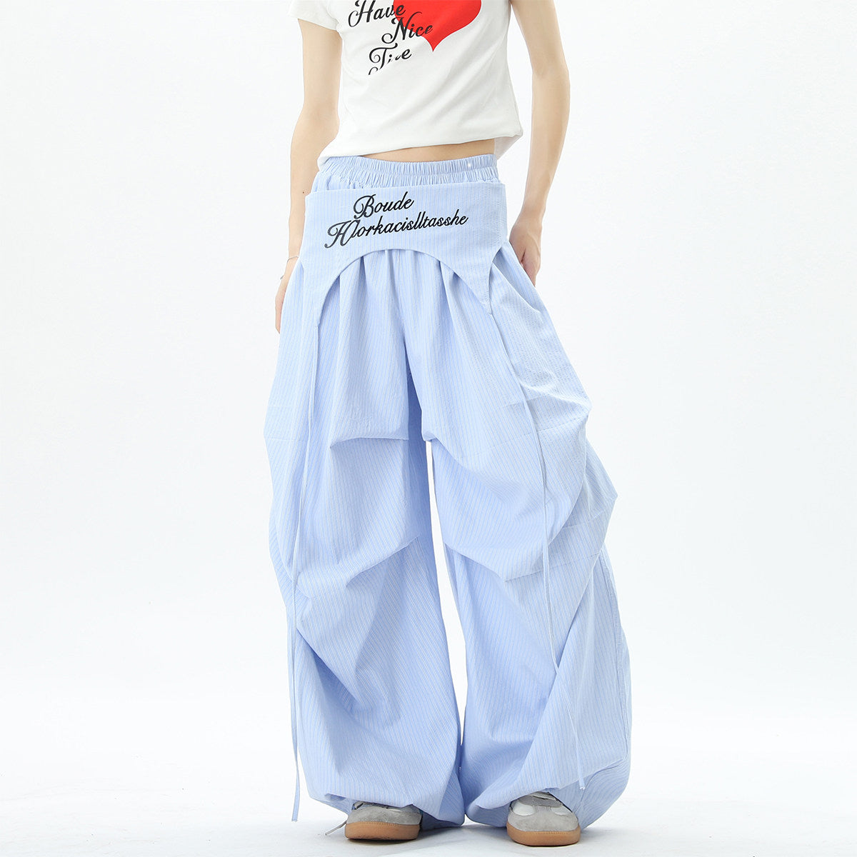 Stylish striped wide-leg trousers with lace-up details, unisex, perfect for summer hip-hop, street dance, and paratrousers. Loose, casual, floor-length trousers.