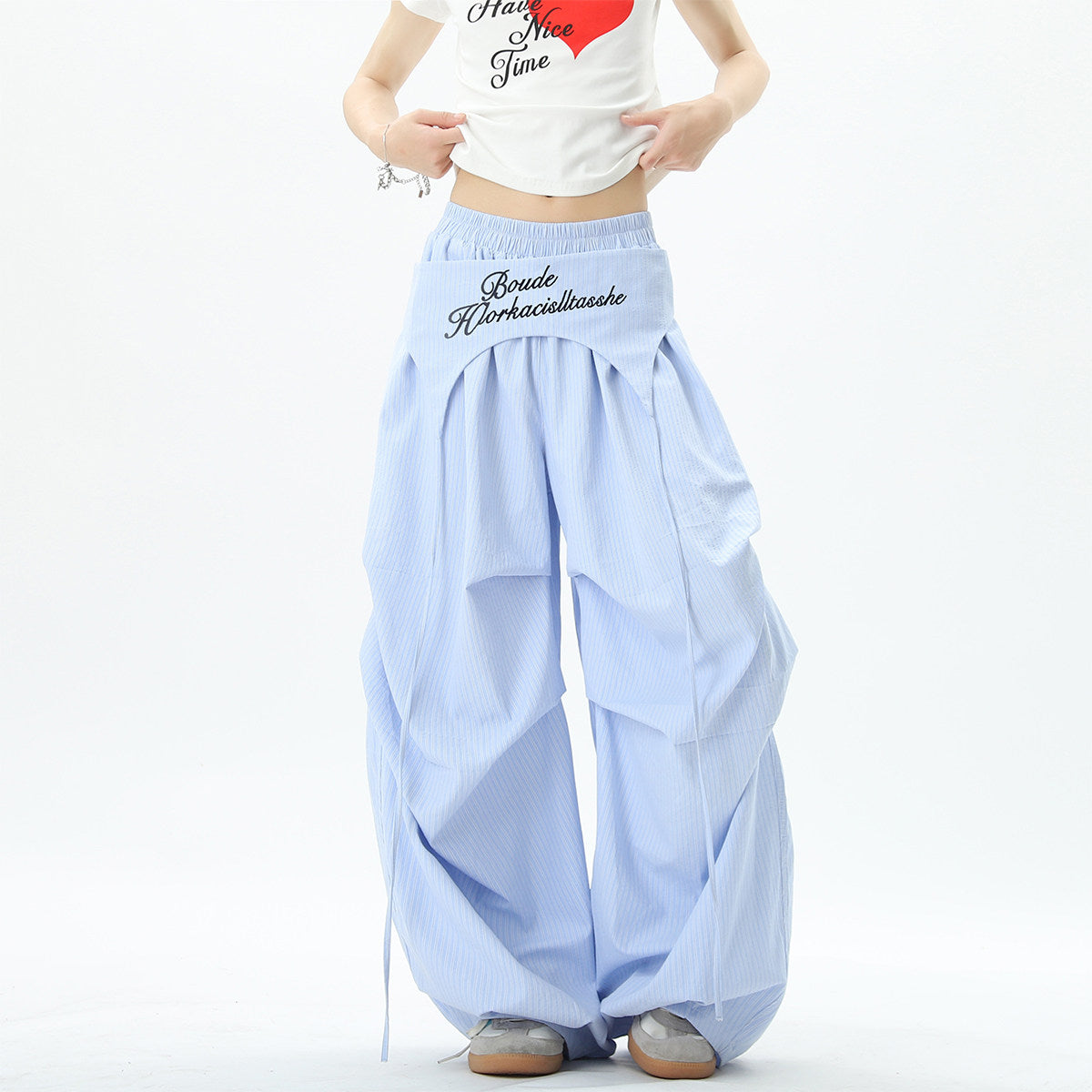 Stylish striped wide-leg trousers with lace-up details, unisex, perfect for summer hip-hop, street dance, and paratrousers. Loose, casual, floor-length trousers.