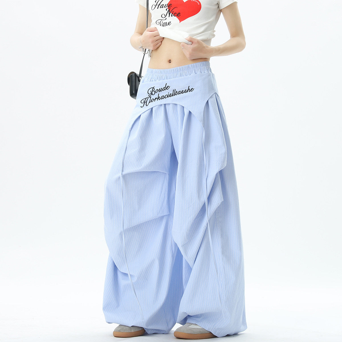 Stylish striped wide-leg trousers with lace-up details, unisex, perfect for summer hip-hop, street dance, and paratrousers. Loose, casual, floor-length trousers.