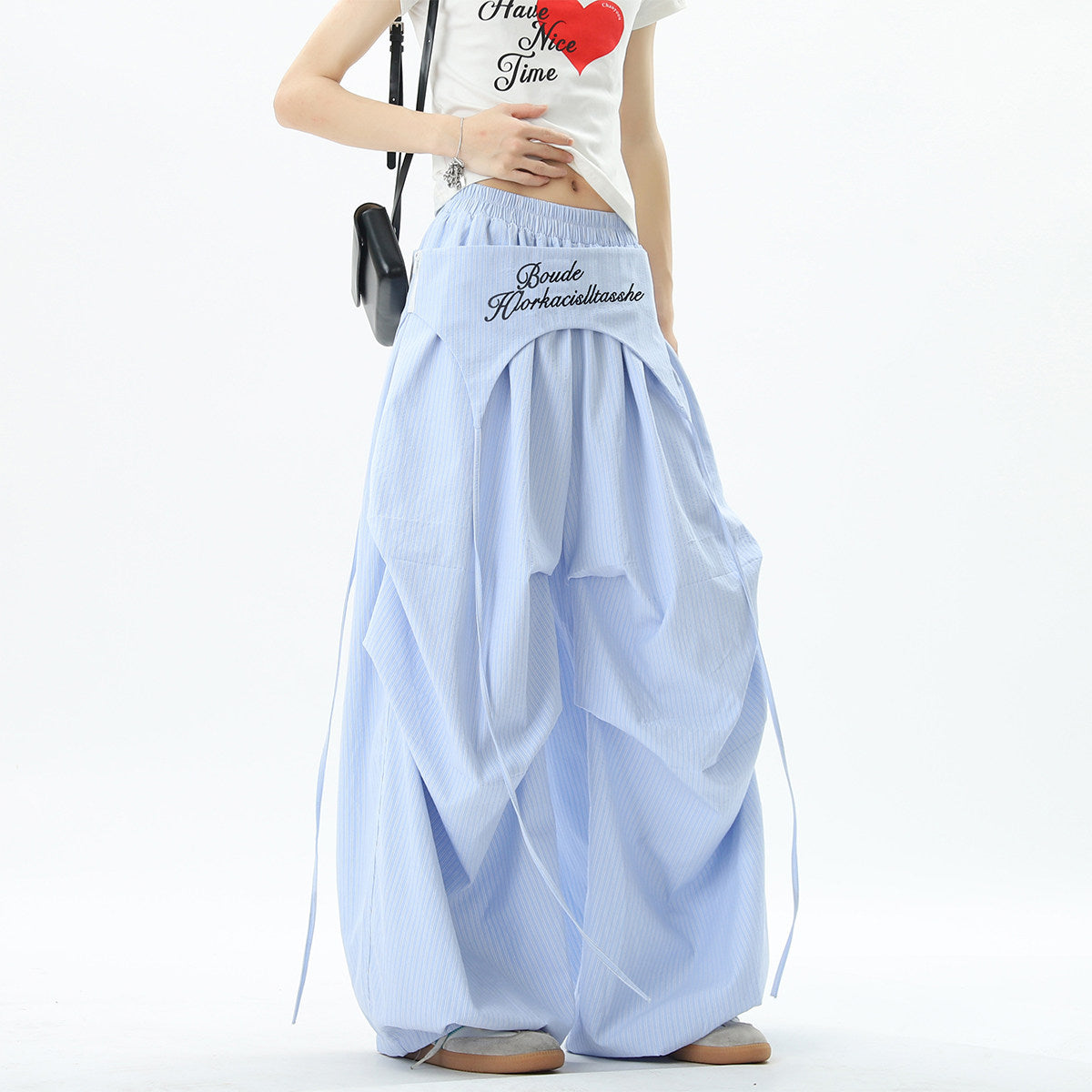 Stylish striped wide-leg trousers with lace-up details, unisex, perfect for summer hip-hop, street dance, and paratrousers. Loose, casual, floor-length trousers.